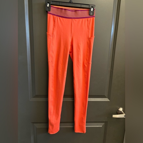 FP Movement by Free People Pants - FP Movement by Free People Vibrant Orange Leggings